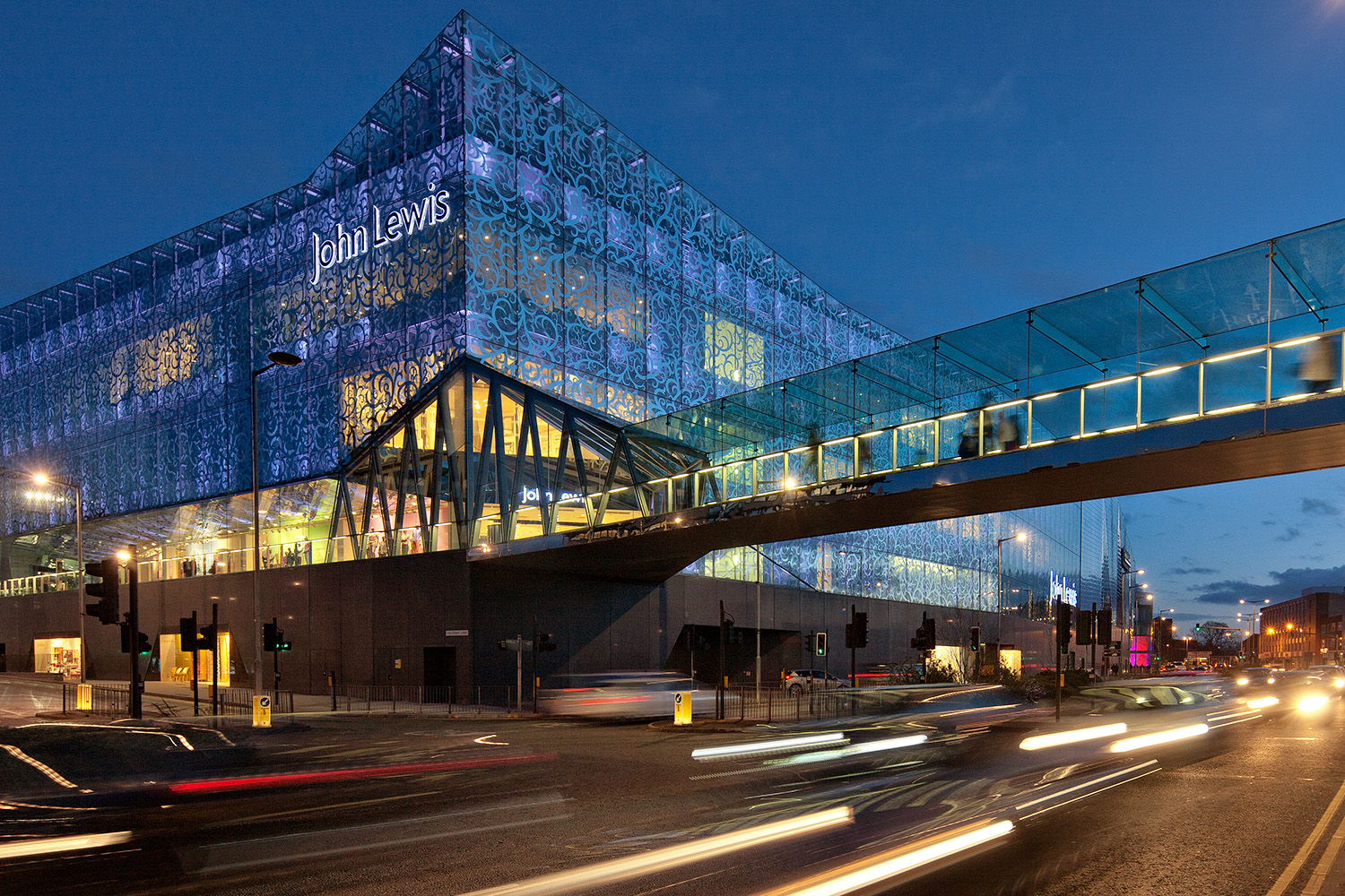 John Lewis store, Leicester. Dusk view with traffic